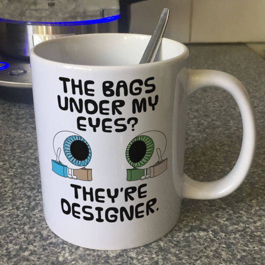 Funny Eye Coffee Mug - The Bags Under My Eyes? They're Designer - Sarcastic Birthday Gift